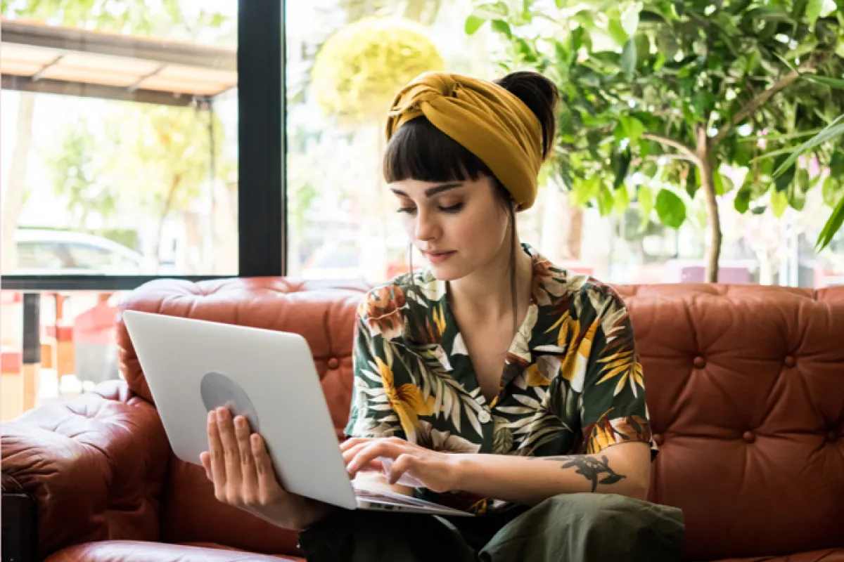 Woman watching on laptop